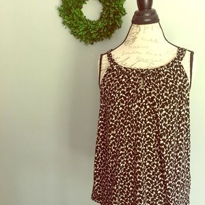 Black & cream colored tank w adjustable key hole